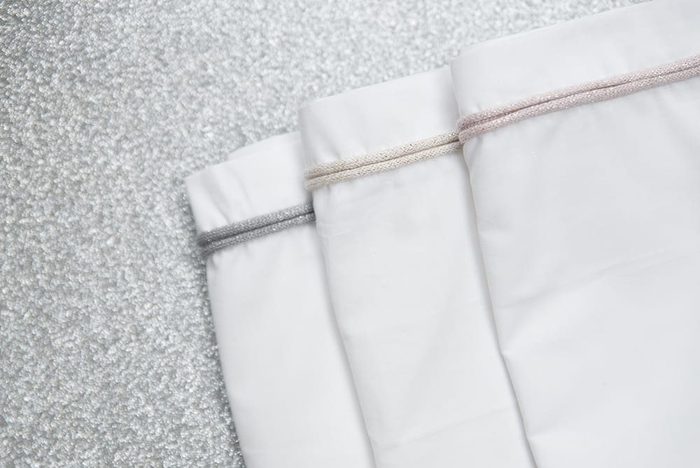 Cot sheet knitted ribbon copper-honey melee/white